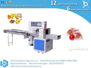 Lollipop, caramelos del arco iris, máquina de embalaje de caramelos, máquina automática de embalaje de almohadas horizontal de alta velocidad proveedor