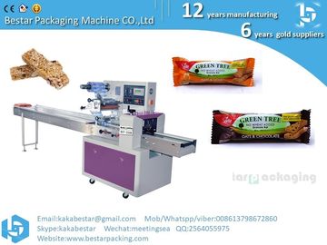 Mejor precio Tipo de almohada Flujo Equipo de envoltura de pasta Máquina automática de embalaje de pan Queso Granola Embalaje de barras de chocolate proveedor